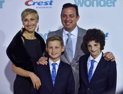 Nathaniel Newman (far right), his brother Jacob and their parents Magda and Russell Newman arrive for the premiere of Wonder at the Regency Village Theatre in Los Angeles on November 14, 2017.  LAP2017111424 CHRISTINExCHEW