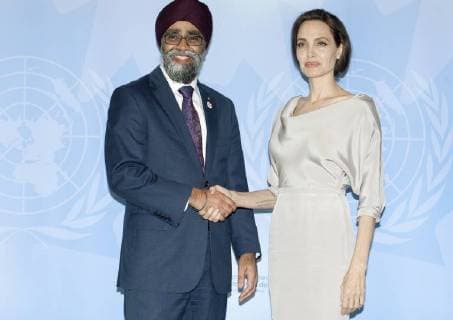 June 28, 2015 - Vancouver, BRITISH COLUMBIA, CANADA - Harjit Singh Sajjan, Canadian (Liberal) Minister of National Defence (L) greets Angelina Jolie, Special Envoy to the UN High Commission for Refugees at a welcoming ceremony during the 2017 UN Peacekeeping Defence Ministerial in Vancouver, British Columbia, November 15, 2017. ZUMA Press Vancouver CANADA - ZUMAr88_ 20150628_zap_r88_011 Copyright: xHeinzxRuckemannx
