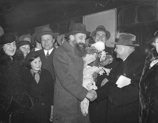 Profesor Otto Schmidt , the Soviet Arctic explorer and leader of the famous expedition of the CHelyuskin , which was marooned in the Arctic and rescued byaeroplanes after several months , arrived at Victoria Station , London to attend the Congress of Peace and Friendship with the USSR which is to take place at Friends House , Euston Road . Professor Schmidt was met by M Maiaky the Soveit Ambassador in London . Photo shows , Professor Otto Schmidt ( left ) greeted by M Maisky , the soviet Ambassador at Victoria Station . 3 December 1935, London United Kingdom England Copyright: Topfoto  UnitedArchivesEU042609