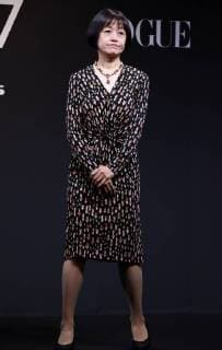 November 24, 2017, Tokyo, Japan - Japanese Naoki award author Riku Onda poses as she receives the trophy of Vogue Japan Women of the Year 2017 award in Tokyo on Friday, November 24, 2017.  (lwxa016150)