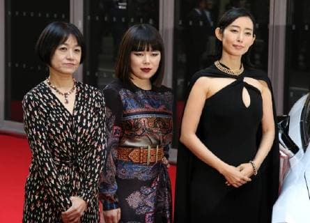 November 24, 2017, Tokyo, Japan - (L-R) Japanese Naoki award author Riku Onda, comedian Buruzon Chiemi and actress Tae Kimura pose for photo on the red carpet as they receive Vogue Japan Women of the Year 2017 award in Tokyo on Friday, November 24, 2017.  (lwxa016163)