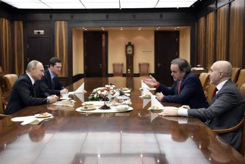 MOSCOW, RUSSIA - DECEMBER 1, 2017: Russia s Vladimir Putin (L front) and US film director and screenwriter Oliver Stone (R back) talk during a meeting in the Moscow Kremlin. Alexei Nikolsky Russian Presidential Press and Information Office TASS  TS06B73E