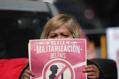 December 5, 2017 - Mexico City, Mexico - Activists hold banners against a law that militarises crime fighting in the country outside the Senate in Mexico City, Mexico December 5, 2017. Placards read, No to the Militarization in the Country Mexico City Mexico  - ZUMAn230 20171205_zaa_n230_550 Copyright: xEmilioxEspejelx