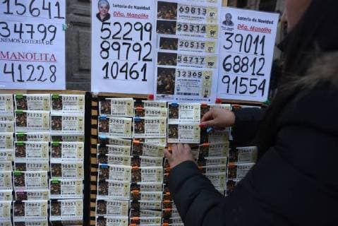 Spain: Long queues in Madrid to buy lottery El Gordo lottery tickets are displayed for sale in Madrid. The Spain s famed Christmas lottery will be celebrated on December 22, 2017. It will be distributed more than 2.3 billion euros ($3 billion) in prizes. Madrid Spain  JorgexSanz