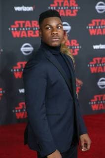 LOS ANGELES, CA - DECEMBER 9: John Boyega at the World Premiere of LucasfilmÕs Star Wars: The Last Jedi at The Shrine Auditorium in Los Angeles, California on December 9, 2017. Copyright: xFayexSadoux