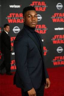 LOS ANGELES, CA - DECEMBER 9: John Boyega at the World Premiere of LucasfilmÕs Star Wars: The Last Jedi at The Shrine Auditorium in Los Angeles, California on December 9, 2017. Copyright: xFayexSadoux