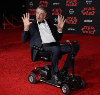 Cast member Peter Mayhew attends the premiere of the sci-fi motion picture fantasy Star Wars: The Last Jedi at the Shrine Auditorium in Los Angeles on December 9, 2017. Storyline: Having taken her first steps into the Jedi world, Rey joins Luke Skywalker on an adventure with Leia, Finn and Poe that unlocks mysteries of the Force and secrets of the past.  LAP2017120923 JIMxRUYMEN