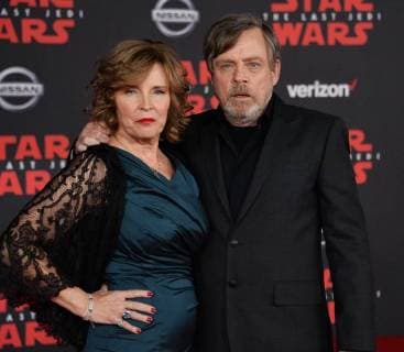 Cast member Mark Hamill and his wife Marilou Hamill attend the premiere of the sci-fi motion picture fantasy Star Wars: The Last Jedi at the Shrine Auditorium in Los Angeles on December 9, 2017. Storyline: Having taken her first steps into the Jedi world, Rey joins Luke Skywalker on an adventure with Leia, Finn and Poe that unlocks mysteries of the Force and secrets of the past.  LAP2017120954 JIMxRUYMEN