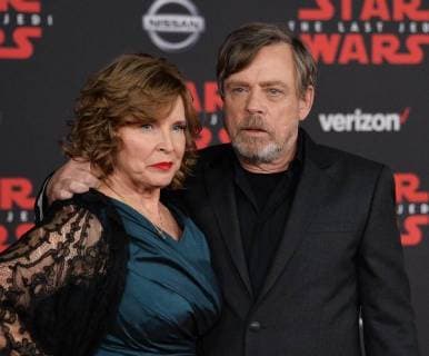Cast member Mark Hamill and his wife Marilou Hamill attend the premiere of the sci-fi motion picture fantasy Star Wars: The Last Jedi at the Shrine Auditorium in Los Angeles on December 9, 2017. Storyline: Having taken her first steps into the Jedi world, Rey joins Luke Skywalker on an adventure with Leia, Finn and Poe that unlocks mysteries of the Force and secrets of the past.  LAP2017120955 JIMxRUYMEN