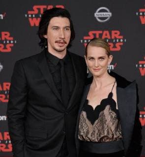 Cast member Adam Driver and his wife Joanne Tucker attend the premiere of the sci-fi motion picture fantasy Star Wars: The Last Jedi at the Shrine Auditorium in Los Angeles on December 9, 2017. Storyline: Having taken her first steps into the Jedi world, Rey joins Luke Skywalker on an adventure with Leia, Finn and Poe that unlocks mysteries of the Force and secrets of the past.  LAP2017120958 JIMxRUYMEN