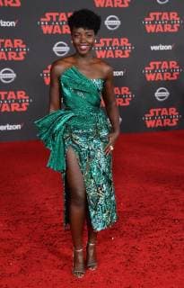 Cast member Lupita Nyong o attends the premiere of the sci-fi motion picture fantasy Star Wars: The Last Jedi at the Shrine Auditorium in Los Angeles on December 9, 2017. Storyline: Having taken her first steps into the Jedi world, Rey joins Luke Skywalker on an adventure with Leia, Finn and Poe that unlocks mysteries of the Force and secrets of the past.  LAP20171209491 JIMxRUYMEN
