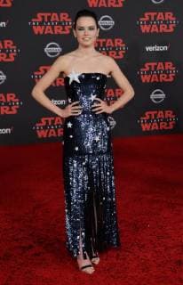 Cast member Daisy Ridley attends the premiere of the sci-fi motion picture fantasy Star Wars: The Last Jedi at the Shrine Auditorium in Los Angeles on December 9, 2017. Storyline: Having taken her first steps into the Jedi world, Rey joins Luke Skywalker on an adventure with Leia, Finn and Poe that unlocks mysteries of the Force and secrets of the past.  LAP2017120906 JIMxRUYMEN