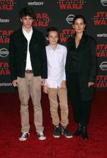 LOS ANGELES, CA - DECEMBER 9: Carrie-Anne Moss, Frances Beatrice Roy, Jaden Roy, Owen Roy, at Premiere Of Disney Pictures And Lucasfilm s Star Wars: The Last Jedi at Shrine Auditorium in Los Angeles, California on December 9, 2017. Copyright: xFayexSadoux