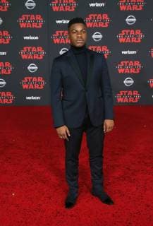LOS ANGELES, CA - DECEMBER 9: John Boyega, at Premiere Of Disney Pictures And Lucasfilm s Star Wars: The Last Jedi at Shrine Auditorium in Los Angeles, California on December 9, 2017. Copyright: xFayexSadoux