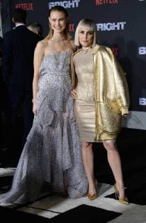 Cast members Lucy Fry (L) and Noomi Rapace attend the premiere of the sci-fi motion picture thriller Bright at the Regency Village Theatre in the Westwood section of Los Angeles on December 13, 2017. Storyline: Set in a world where mystical creatures live side by side with humans. A human cop is forced to work with an Orc to find a weapon everyone is prepared to kill for.  LAP2017121386 JIMxRUYMEN