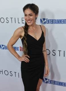 Cast member Q orianka Kilcher attends the premiere of the motion picture western Hostiles at the Academy of Motion Picture Arts & Sciences in Beverly Hills, California on December 14, 2017. Storyline: In 1892, a legendary Army captain reluctantly agrees to escort a Cheyenne chief and his family through dangerous territory.  LAP2017121412 JIMxRUYMEN