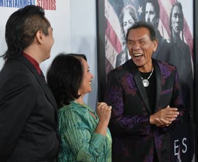 Cast member Wes Studi (R) and his wife Maura Dhu Studi and son Kholan Studi attend the premiere of the motion picture western Hostiles at the Academy of Motion Picture Arts & Sciences in Beverly Hills, California on December 14, 2017. Storyline: In 1892, a legendary Army captain reluctantly agrees to escort a Cheyenne chief and his family through dangerous territory.  LAP2017121421 JIMxRUYMEN