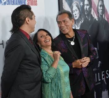 Cast member Wes Studi (R) and his wife Maura Dhu Studi and son Kholan Studi attend the premiere of the motion picture western Hostiles at the Academy of Motion Picture Arts & Sciences in Beverly Hills, California on December 14, 2017. Storyline: In 1892, a legendary Army captain reluctantly agrees to escort a Cheyenne chief and his family through dangerous territory.  LAP2017121422 JIMxRUYMEN