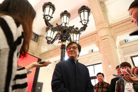 Hong Kong kungfu star Jackie Chan attends a ceremony to mark his donation of an antique street lamp and six replicas to the Shanghai History Museum in Shanghai, China, 17 December 2017. Jackie Chan on Sunday (17 December 2017) donated an antique street lamp and six replicas to the Shanghai History Museum. The 63-year-old film actor posed for pictures with one of the replicas during a ceremony at the museum at 325 Nanjing Road W. The original lamp is undergoing restoration, the museum said. Chan, a keen antiques collector outside his movie career, said he spotted a number of ornate street lamps on sale while filming in the United States many years ago. The Taiwan couple selling them said they were from Shanghai during the Republic of China (1912-1949) period. He bought 19 lamps from the couple at up to US$4,500 each and had them shipped  pbu726482_04