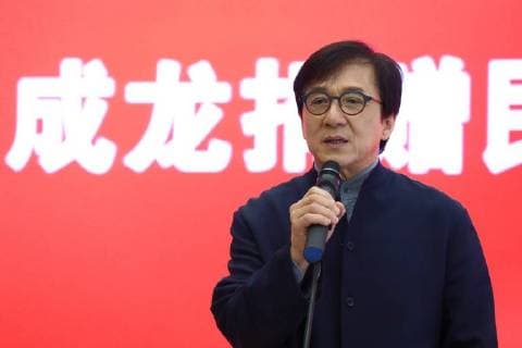 Hong Kong kungfu star Jackie Chan attends a ceremony to mark his donation of an antique street lamp and six replicas to the Shanghai History Museum in Shanghai, China, 17 December 2017. Jackie Chan on Sunday (17 December 2017) donated an antique street lamp and six replicas to the Shanghai History Museum. The 63-year-old film actor posed for pictures with one of the replicas during a ceremony at the museum at 325 Nanjing Road W. The original lamp is undergoing restoration, the museum said. Chan, a keen antiques collector outside his movie career, said he spotted a number of ornate street lamps on sale while filming in the United States many years ago. The Taiwan couple selling them said they were from Shanghai during the Republic of China (1912-1949) period. He bought 19 lamps from the couple at up to US$4,500 each and had them shipped  pbu726482_08