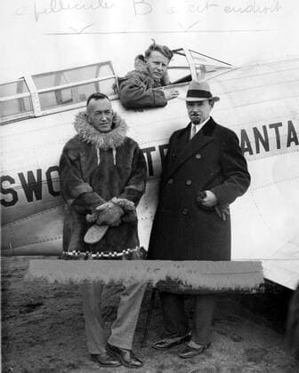 Antarctic expedition plane tested. Before being dismantled and shipped to Northern Canada, the powerful Northrop Gamma plane to be used in the expedition into the Antarctic, was tested at Teterboro Airport. Left to right Lincoln Ellsworth (expedition leader), Bernt Balchen, pilot and Sir Hubert Wilkins. 25 January 1933, New Jersey United States Copyright: Topfoto  !ACHTUNG AUFNAHMEDATUM GESCHÄTZT! UnitedArchives1324483