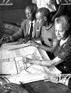 Negro integration leaders plots route of projected March on Washington, one match in a headquarters building. Left to right: A Philip Randolph, president of the brotherhood of sleeping car porters; Roy Wilkins, executive secretary of the National Association for the advancement of colored people (NAACP); and Anna Arnold Hedgeman. 3 August 1963, New York City New York United States Copyright: Topfoto  !ACHTUNG AUFNAHMEDATUM GESCHÄTZT! UnitedArchives1345987