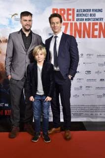Jan Zabeil, Arian Montgomery und Alexander Fehling bei der Premiere des Kinofilms Drei Zinnen Three Peaks im Kino International. Berlin, 20.12.2017
