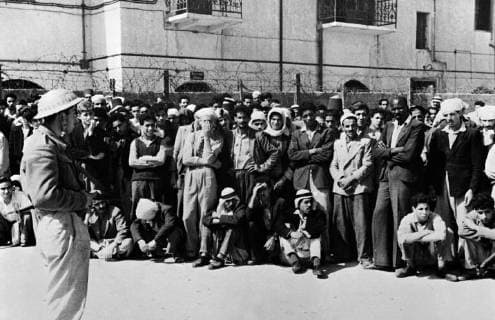 Arab prisoners at Acre in battle for Lebanese border. The Jewish and Lebanese forces now face each other 1,000 yards apart at Ras El Naqura on the Lebanese Frontier in the battle for the border which is the latest development that followed the fall of Acre. Haganah cleared the coastal road from Acre towards the frontier and brought many prisoners back to Acre. Photo shows ; Some of the Arab prisoners seen shortly after arrival in Acre. 27 May 1948, Acre Israel Copyright: Topfoto  !ACHTUNG AUFNAHMEDATUM GESCHÄTZT! UnitedArchives1379556
