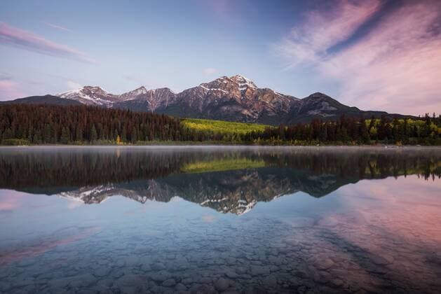 Pyramid Mountain reflected in Patricia Lake in autumn at sunrise, Jasper National Park, UNESCO World Heritage Site, Canadian Rockies, Alberta, Canada, North America Copyright: JonxReaves 1241-85