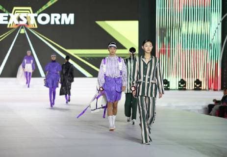 (171227) -- DONGFANG, Dec. 27, 2017 -- Models walk down runway during the 17th China Fashion Model Contest in Dongfang City, south China s Hainan Province, Dec. 26, 2017. Tens of thousands contestants signed up for the contest with only 30 female and 20 male contestants made it to the finals. ) (lx) CHINA-HAINAN-MODEL CONTEST(CN) ChengxTingting 
