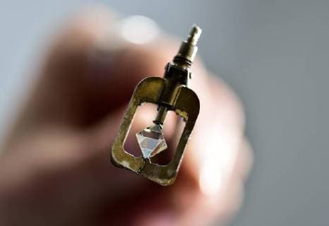 VLADIVOSTOK, RUSSIA â€“ DECEMBER 27, 2017: An uncut diamond before being put in a 3d scanner to create a three-dimensional model of a crystal at the KGK DV diamond cutting factory operated by KGK Group. The factory is expected to cut up to 9,000 carats of rough diamonds supplied by the Alrosa diamond mining company per month. Yuri Smityuk TASS  TS06ED76