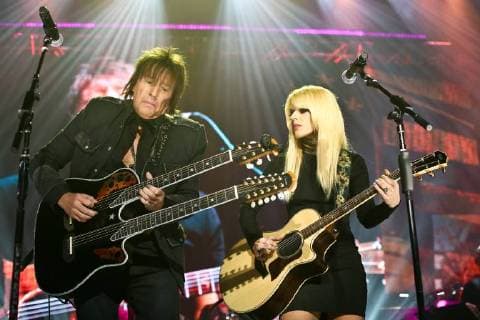 USA: 2017 Wall Street Rocks NEW YORK, NY - NOVEMBER 29: Musician Richie Sambora (L) and Orianthi perform at America Salutes You and Wall Street Rocks Presents Guitar Legends For Heroes at Terminal 5 on November 29, 2017 in New York City. New York New York United States  DebbyxWong