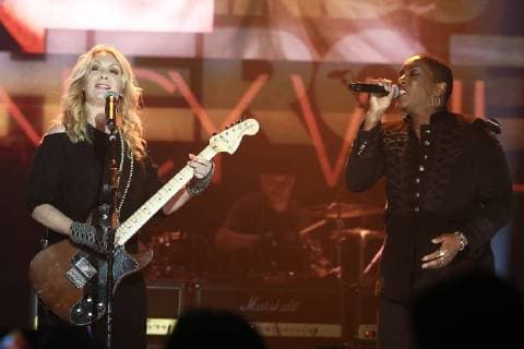 USA: 2017 Wall Street Rocks NEW YORK, NY - NOVEMBER 29: Musician Nancy Wilson (L) and Liv Warfield perform at America Salutes You and Wall Street Rocks Presents Guitar Legends For Heroes at Terminal 5 on November 29, 2017 in New York City. New York New York United States  DebbyxWong