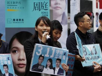 January 7, 2018 - Hong Kong, CHINA - Standing committee member of the pro-democratic political party DEMOSISTO, Agnes Chow ( centre, with mic ) campaigned for citizens support in the coming LEGICO by-election. 7-Jan 2018 Hong Kong.ZUMA Hong Kong CHINA - ZUMAl137 20180107_zap_l137_002 Copyright: xLiauxChungxRenx