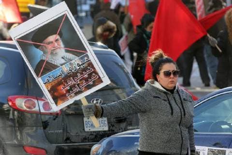 January 6, 2018 - Toronto, Ontario, Canada - Hundreds of Canadians take part in a protest against the Islamic Republic of Iran in Toronto, Ontario, Canada, on January 06, 2018. Protestors showed their solidarity with anti-government demonstrators in Iran and their support of a national uprising of the Iranian people. Protesters called for a regime change for social justice and freedom and democracy in Iran. There was a also a call that power in Iran be returned to Reza Pahlavi, the former Crown Prince of Iran and the last heir apparent to the defunct throne of the Imperial State of Iran and the current head of the exiled House of Pahlavi. Toronto Canada  - ZUMAn230 20180106_zaa_n230_1143 Copyright: xCreativexTouchxImagingxLtdx