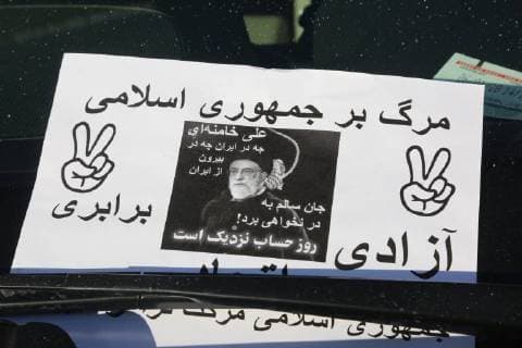 January 6, 2018 - Toronto, Ontario, Canada - Leaflet on the windshield of a vehicle as hundreds of Canadians take part in a protest against the Islamic Republic of Iran in Toronto, Ontario, Canada, on January 06, 2018. Protestors showed their solidarity with anti-government demonstrators in Iran and their support of a national uprising of the Iranian people. Protesters called for a regime change for social justice and freedom and democracy in Iran. There was a also a call that power in Iran be returned to Reza Pahlavi, the former Crown Prince of Iran and the last heir apparent to the defunct throne of the Imperial State of Iran and the current head of the exiled House of Pahlavi. Toronto Canada  - ZUMAn230 20180106_zaa_n230_1153 Copyright: xCreativexTouchxImagingxLtdx