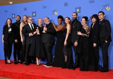 (L-R) Actors Alexis Bledel, O-T Fagbenle, Yvonne Strahovski, Producers Warren Littlefield, Bruce Miller, actors Samira Wiley, Madeline Brewer, Joseph Fiennes, Ann Dowd, Reed Morano and Max Minghella appear backstage after winning the award for Best Television Series Drama for The Handmaid s Tale during the 75th annual Golden Globe Awards at the Beverly Hilton Hotel in Beverly Hills, California on January 7, 2018.  LAP20180107489 JIMxRUYMEN