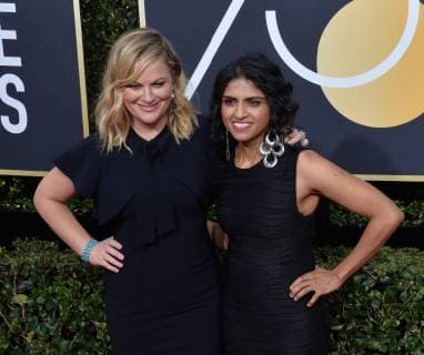 Actor Amy Poehler and activist Saru Jayaraman attend the 75th annual Golden Globe Awards at the Beverly Hilton Hotel in Beverly Hills, California on January 7, 2018.  LAP20180107891 JIMxRUYMEN