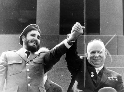 SOVIET PRIME MINISTER NIKITA KHRUSHCHEV WITH CUBAN PRIME MINISTER FIDEL CASTRO HOLDING HANDS AT MAY DAY CELEBRATIONS IN MOSCOW ; 1 MAY 1963, Copyright: Topfoto  UnitedArchivesIPU455714