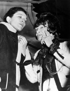 IMAGO ICONS: Coco Chanel 30 JANUARY 1964 GABRIELLE COCO CHANEL TALKS TO AN ADMIRER DURING THE SHOWING OF HER 1964 SPRING SUMMER COLLECTION IN PARIS. FRANCE, Paris France Copyright: Topfoto  UnitedArchivesIPU470689