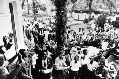 MINISTERS TSHOMBE AND ANTOINE GIZENGA GREET CROWDS IN LEOPOLDVILLE, CONGO ; 19 JULY 1964, LEOPOLDVIL Copyright: Topfoto  UnitedArchivesIPU481039