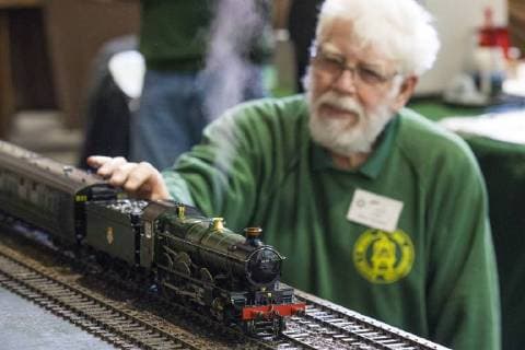 January 19, 2018 - London, London, UK - London, UK. A member of the Gauge 1 Steam Locomotive Society tends to a model train at the London Model Engineering Exhibition at Alexandra Palace. Over 50 clubs and societies are exhibiting nearly 2,000 models constructed by their members. London UK  - ZUMAl94_ 20180119_zaf_l94_023 Copyright: xRobxPinneyx