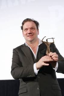 Der Schauspieler Charly Huebner wird am 28.01.2018 mit dem Ernst Lubitsch Preis fuer seine komoediantische Leistung im Film Magical Mystery oder: Die Rueckkehr des Karl Schmidt geehrt. Die Verleihung der traditionsreichen Trophaee erfolgte im Rahmen einer Gala im Kino Babylon in Berlin Mitte. Der Club der Filmjournalisten Berlin vergibt seit 1958 den Ernst-Lubitsch-Preis fuer die beste komoediantische Leistung im Deutschen Film. Berlin Germany