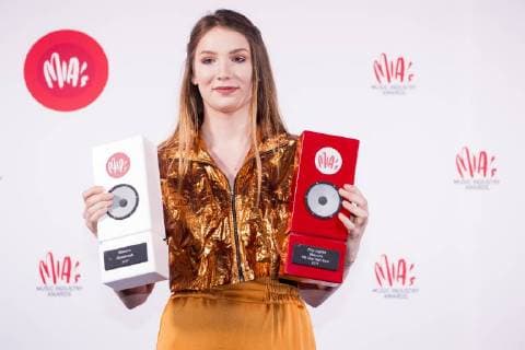 Ellie Delvaux aka Blanche celebrates with her trophies at the eleventh edition of the MIA s (Music Industry Award) award show, in Brussels, Tuesday 30 January 2018. The MIA awards are handed out by the VRT and Kunstenpunt.  JASPERxJACOBS 05286831