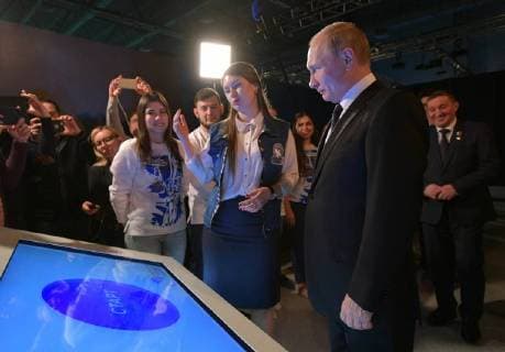 VOLGOGRAD, RUSSIA â€“ FEBRUARY 2, 2018: Russia s President Vladimir Putin (R) meets with members of the Volunteers of Victory movement at the Russia My History museum. Alexei Druzhinin Russian Presidential Press and Information Office TASS  TS072086