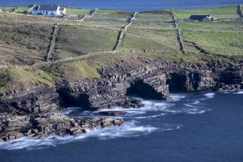 Cliffs and caves along the Wild Atlantic Way at Muckross Head, County Donegal, Ulster, Republic of Ireland, Europe Copyright: DavidxSpeight 1266-39