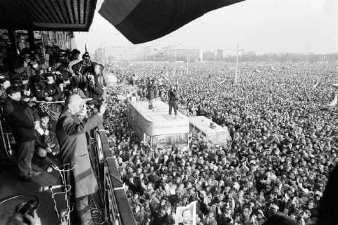 Prague Spring 1968 leader Alexander Dubcek waves to the crowds below during anti-government demonstration at Letna plain in Prague on November 26, 1989. CTK Photo CTKPhotoFO01142466 