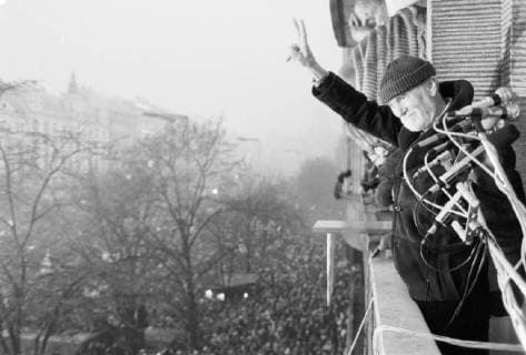 A brutal police action against peaceful march of students in Prague on November 17, 1989, sparked the Velvet Revolution, a series of non-violent demonstrations that toppled the authoritarian Communist regime in Czechoslovakia. Miroslav Machacek, actor and director of the National Theatre, waves to crowds in Wenceslas Square during a rally on December 4, 1989. CTK Photo Libor Hajsky CTKPhotoFO01142522 