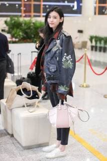 Chinese model Xi Mengyao, better known as Ming Xi, is pictured at the Beijing Capital International Airport in Beijing, China, 8 February 2018. Ming Xi flashes slim figure in casual wear at Beijing airport  20180208_63484