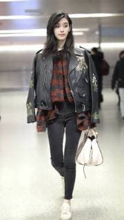 Chinese model Xi Mengyao, better known as Ming Xi, is pictured at the Beijing Capital International Airport in Beijing, China, 8 February 2018. Ming Xi flashes slim figure in casual wear at Beijing airport  pbu752495_13